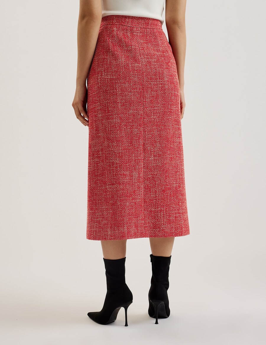 sumis - krojena midi suknja od buklea s prednjim prorezom